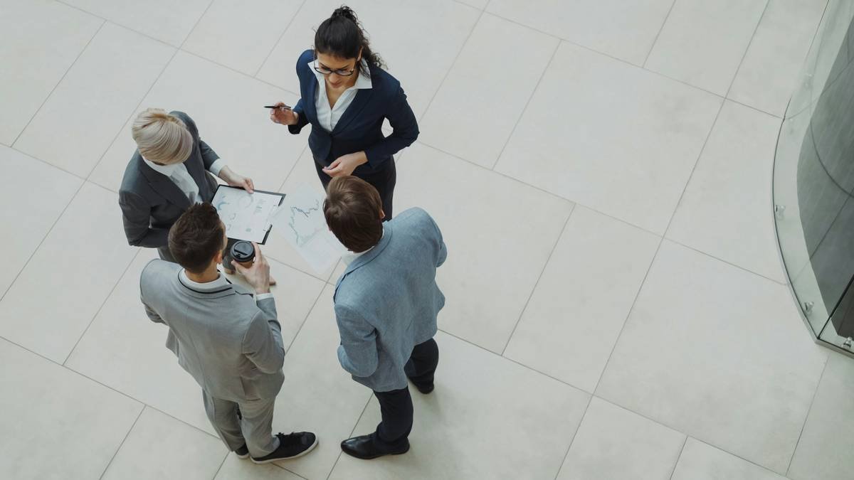 Enterprise strategy consulting team analyzing financial data in war room